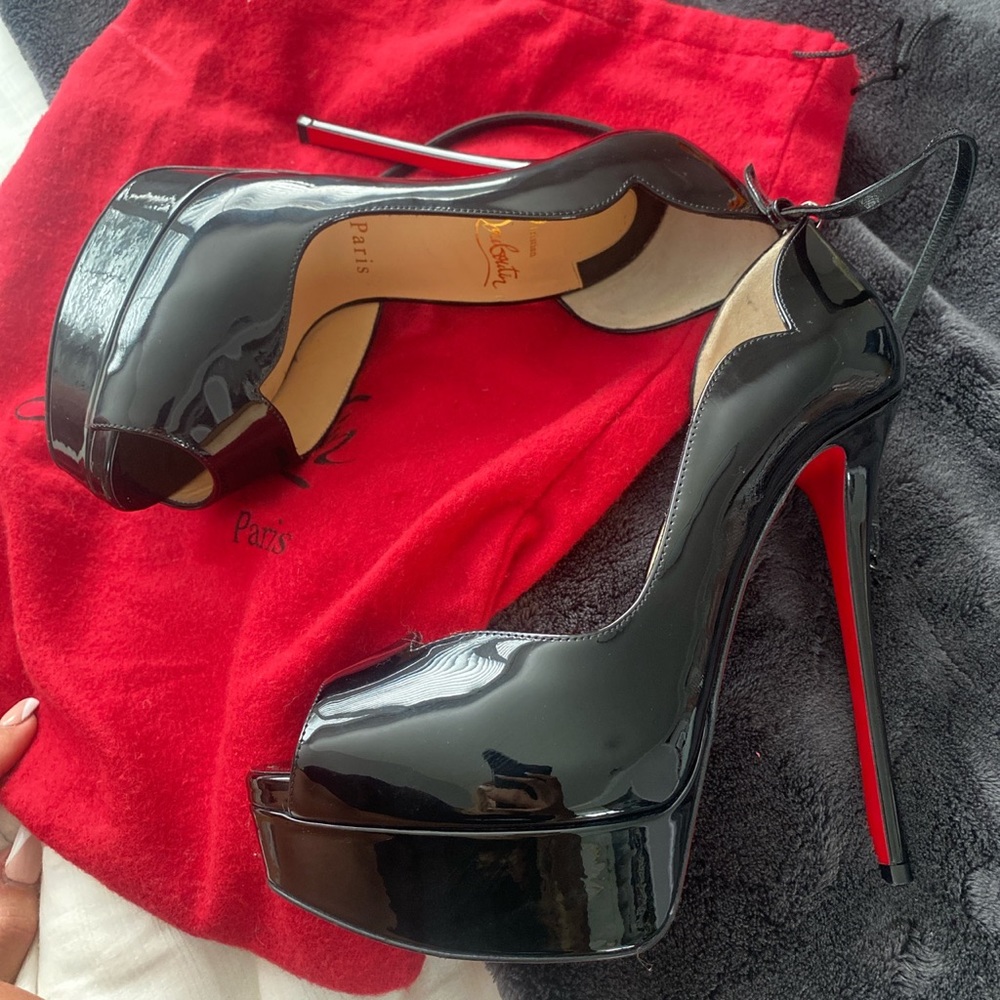Brand new Christian Louie heels I only wore those twice !!! Recently purchased